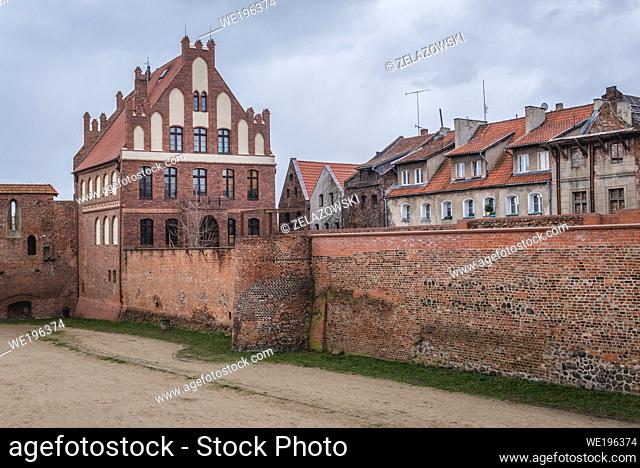 Manor of the Brotherhood of Saint George late gothic building seen from moat of the Teutonic Castle in Old Town of Torun, Poland