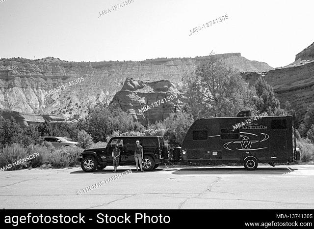 Jeep and Caravan at the parking lot. Hiking through the Angel's Palace Trail in Kodakchrome Basin State Park, Utah, USA