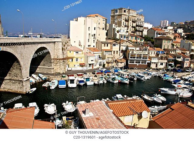 Typical Harbour and houses of the Vallon des Auffes, coast road/corniche, Marseille, Bouches du Rhone, 13, France, small homes and high building