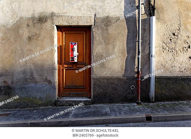 Condom vending machine on the door of a house, historic town centre of Langres, department of Haute-Marne, Champagne-Ardenne region, France, Europe
