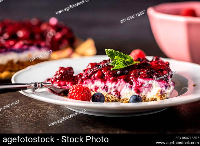 Sweet berry cake. Pie with blueberries and raspberries on plate