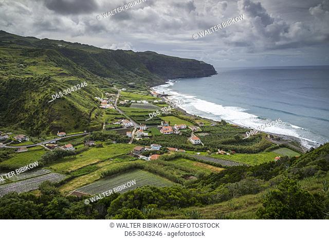 Portugal, Azores, Santa Maria Island, Praia, elevated view of town and Praia Formosa beach, morning