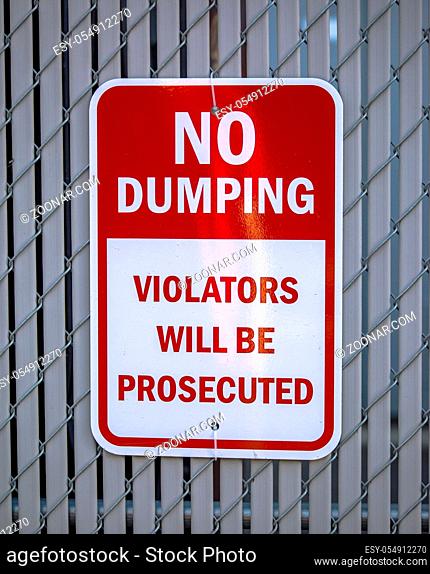 No dumping violators will be prosecuted sign spotted in downtown Salt Lake City