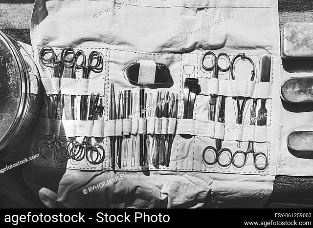 Old Medical And Surgical Instruments. Many Surgical Instruments For Surgery. Old Different Metal Medical Instruments Objects
