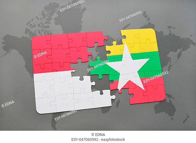 puzzle with the national flag of indonesia and myanmar on a world map background. 3D illustration