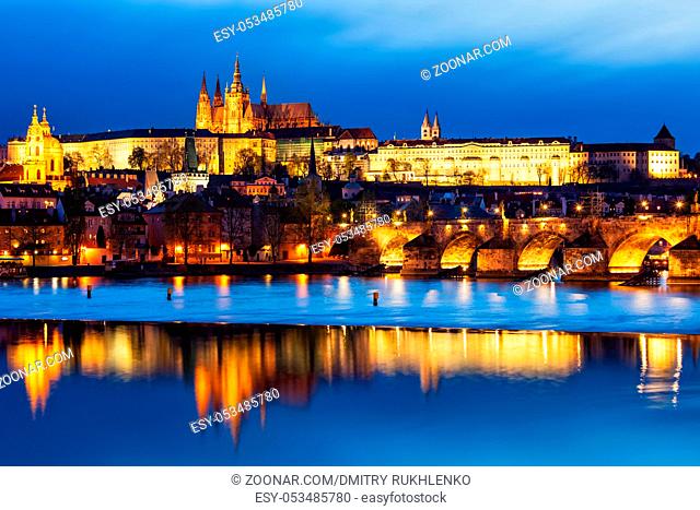 View of Charles Bridge (Karluv most) and Prague Castle in twilight. Prague, Czech Republic