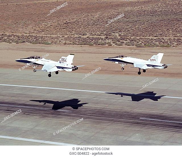 Two NASA Dryden F/A-18's land on the Edwards Air Force Base runway after completion of an Autonomous Formation Flight AFF mission