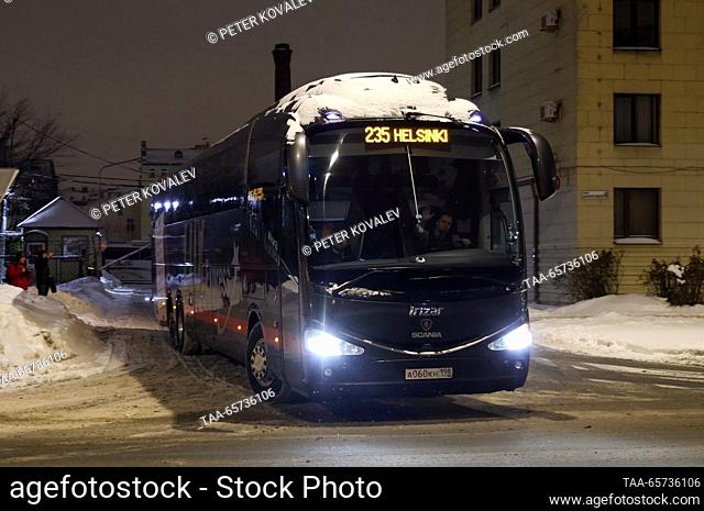 RUSSIA, ST PETERSBURG - DECEMBER 14, 2023: A Helsinki-bound bus operated by Ecolines leaves a bus station. Finland's government has announced it will re-open...
