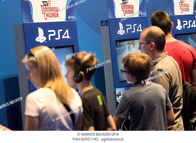 Visitors at hte Sony Playstation stall at the Gamescom gaming convention in Cologne, Germany, 18 August 2016. The Gamescom gaming convention runs from 17-21...