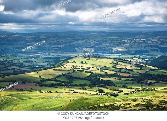 Dramitic light over rural landscape and Wye Valley seen from Hay Bluff, Brecon Beacons national park, Wales