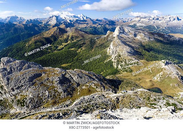 Mount Marmolada, the queen of the dolomites. In the foreground Valparola mountain road and mountain pass. The Dolomites are listed as UNESCO World heritage