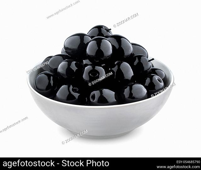 Heap of black olives in bowl isolated on white background with clipping path, close up