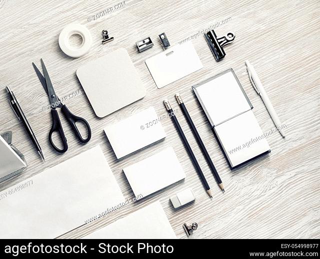 Blank corporate stationery set on light wooden background. ID template. Branding mock-up. Flat lay