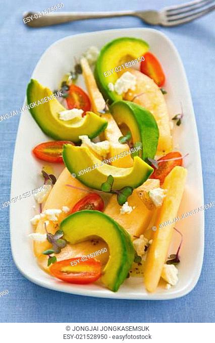 Avocado with melon and Feta cheese salad