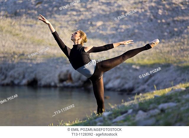 Ballerina dancing in a natural environment
