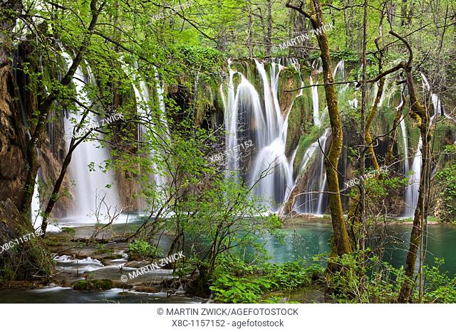 The Plitvice Lakes in the National Park Plitvicka Jezera in Croatia  The upper lakes, ponds and waterfalls with lush vegetation  The Plitvice Lakes are a string...