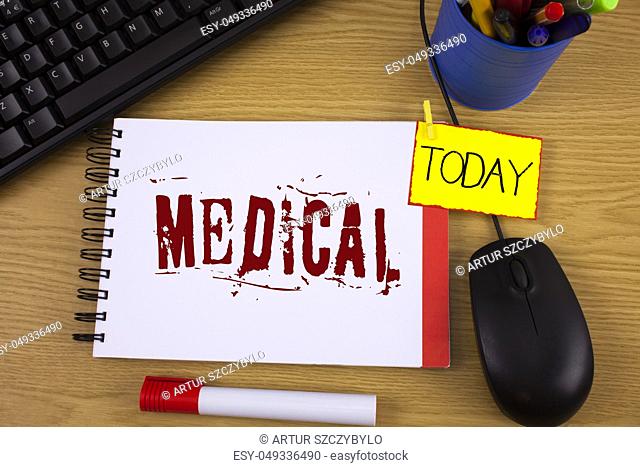 Word writing text Medical. Business concept for Related to science of Medicine Treatment for illness or injuries written Noteoad wooden background Today Marker...