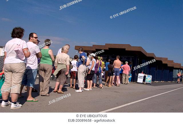 Customers queuing at the East Beach Cafe designed by Thomas Heatherwick