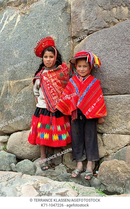 Peruvian children in traditional dress in Ollantaytambo, Urubamba Valley, Peru, South America