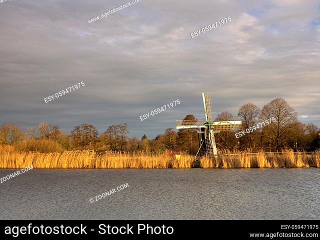 The Follega windmill seen from across the river Oude IJssel near the Dutch village Laag-Keppel