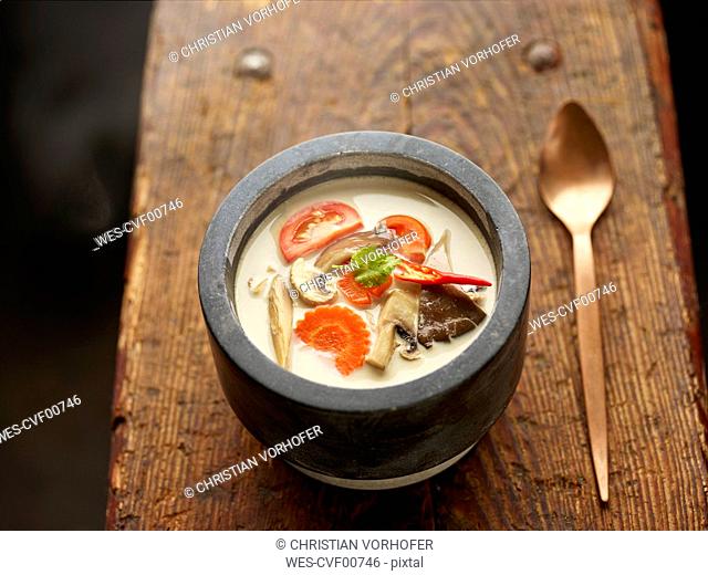 Asian Tom Kha Gai soup in bowl