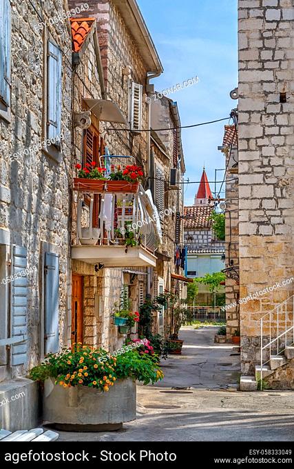 Narrow street in Trogir old town, Croatia