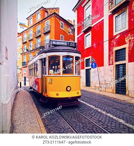 Traditional Yellow Tram on the street of Lisbon, Portugal
