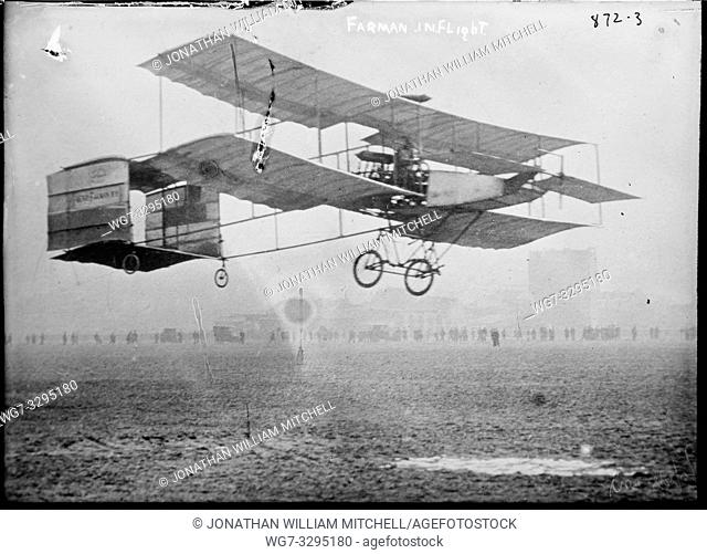 FRANCE -- circa. 1910 -- Farman III biplane in flight at an early airshow in France -- Picture by Atlas Photo Archive