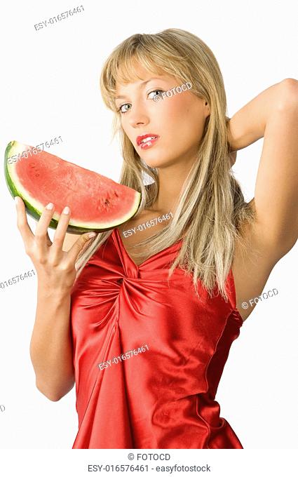 cute blond girl in red dress and red lips and a piece of water melon in her hand