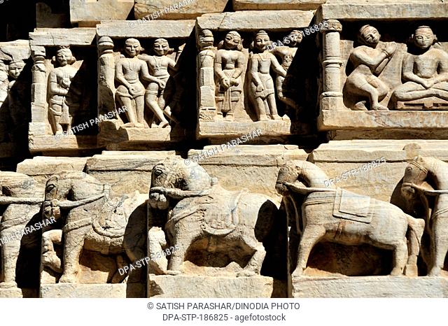 Row of horses carved on the wall of jagdish temple of vishnu in udaipur rajasthan india Asia