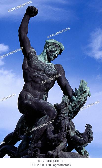 Gellert Hill. Detail of statue of male figure slaying a multi headed serpant.Eastern Europe