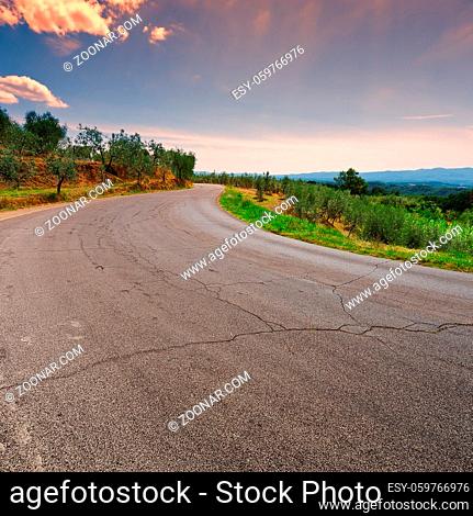 Winding Paved Road in Tuscany at Sunset, Vintage Style Toned Picture