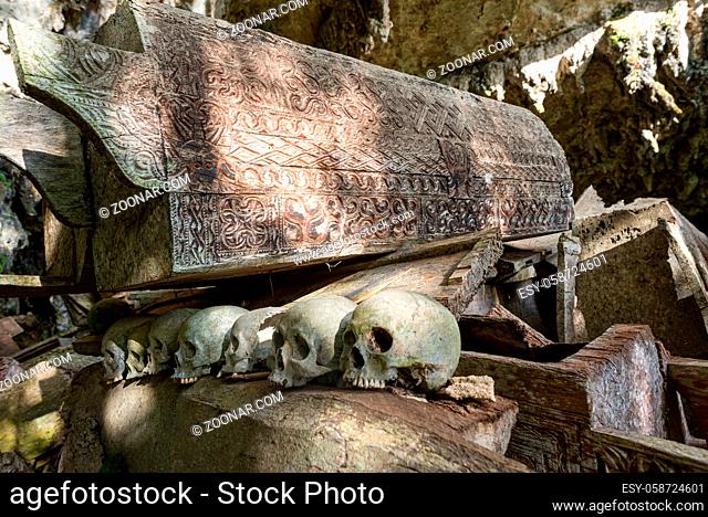 The spectacular cave tomb of Lombok Parinding which has housed the dead of Tana Toraja since 700 years. The tomb is famous for its ancient, ornate coffins