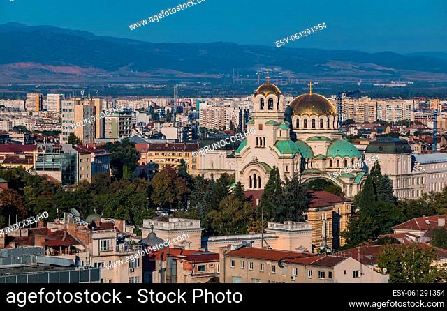 A picture of the Alexander Nevsky Cathedral as seen through Sofia's rooftops