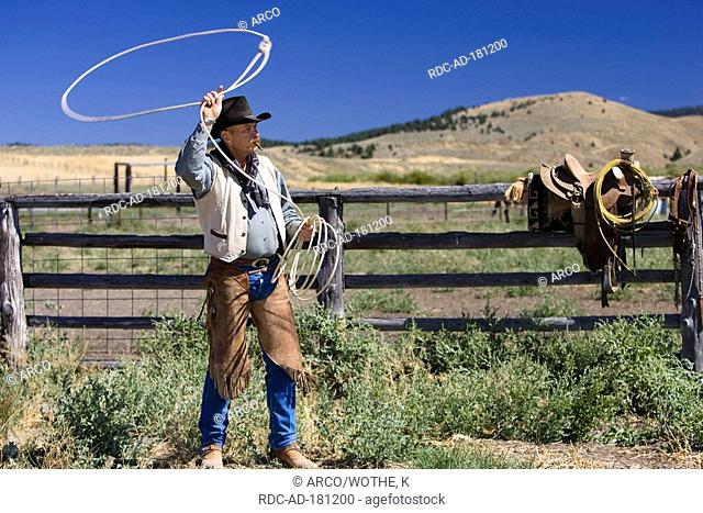 Man in western outfit with lasso, Ponderosa Ranch, Oregon, USA, Wild West