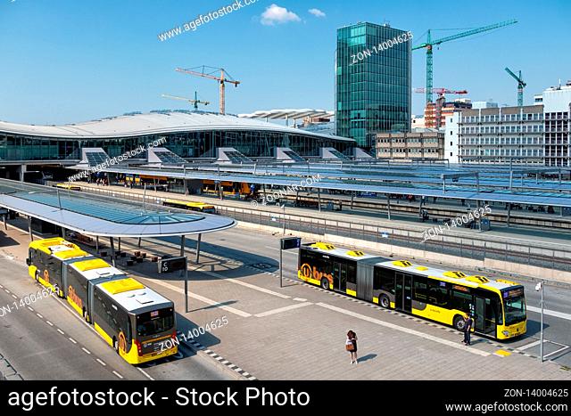 Utrecht, The Netherlands - May 15, 2018: City buses arriving at bus station near main railway station Utrecht