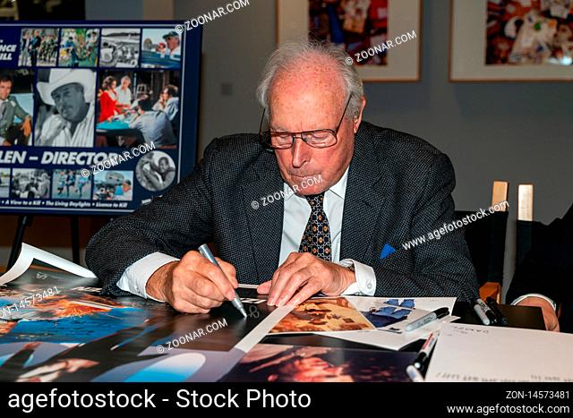 FRANKFURT AM MAIN, Germany - November 3rd 2019: John Glen (*1932, british film director an editor, most famous for directing a record five bond films) signing...