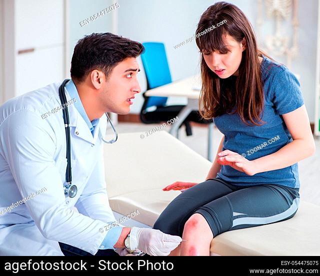 The patient visiting doctor after sustaining sports injury