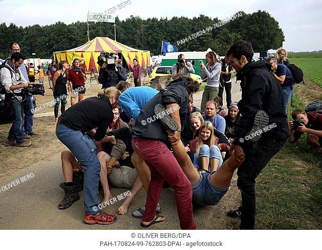 Activists practicing a sit-in in the Climate Camp near Erkelenz, Germany, 24 August 2017. No protests have been reported yet at the start of the registered...