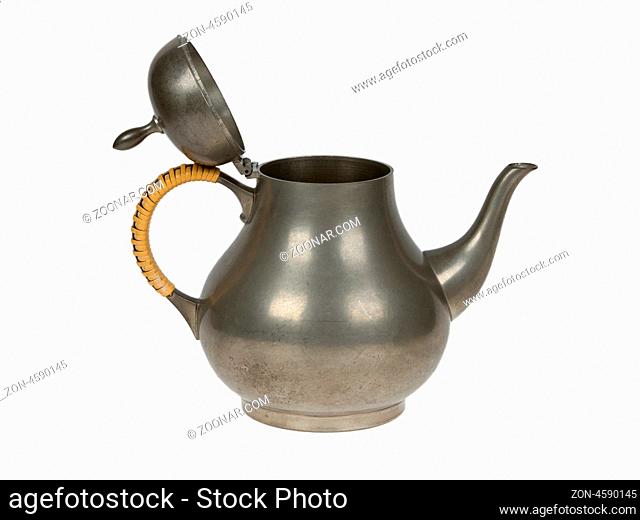 Very old tin tea pot full of scratches, isolated on white