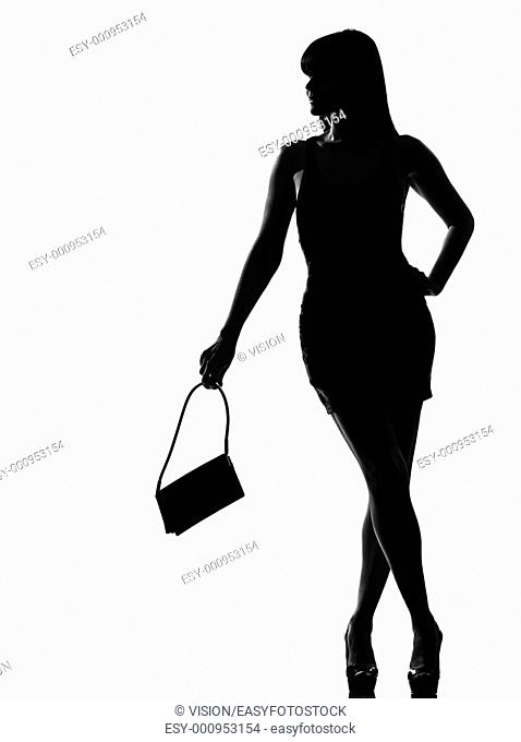 stylish silhouette caucasian beautiful woman holding purse waiting full length on studio isolated white background