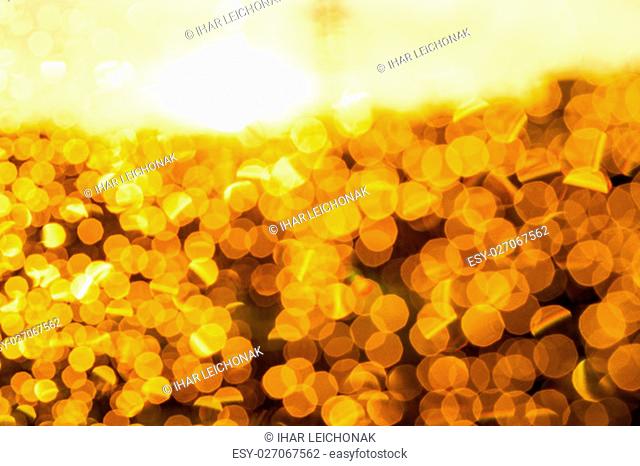 orange circles. Photo of water drops on glass at sunset, which formed bokeh, defocused