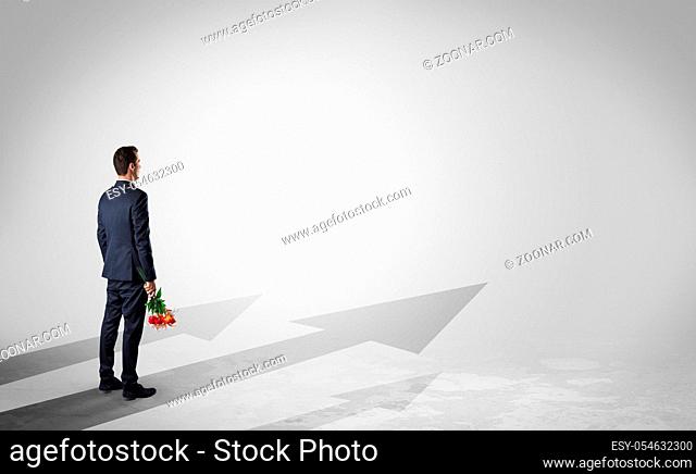 Man with object in his hand on the direct way to success