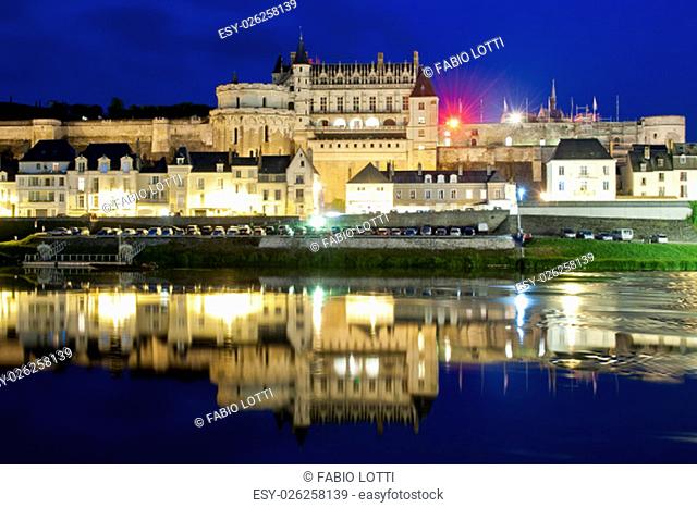 The chateau d'Amboise reflecting in the Loire river, at the blue hour