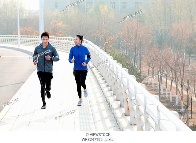 Young couples outdoor jogging