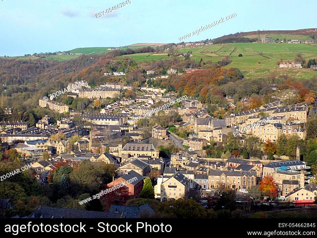 panoramic aerial view of the town of hebden bridge in west yorkshire showing the streets houses and old mill buildings set in the surrounding pennine hills
