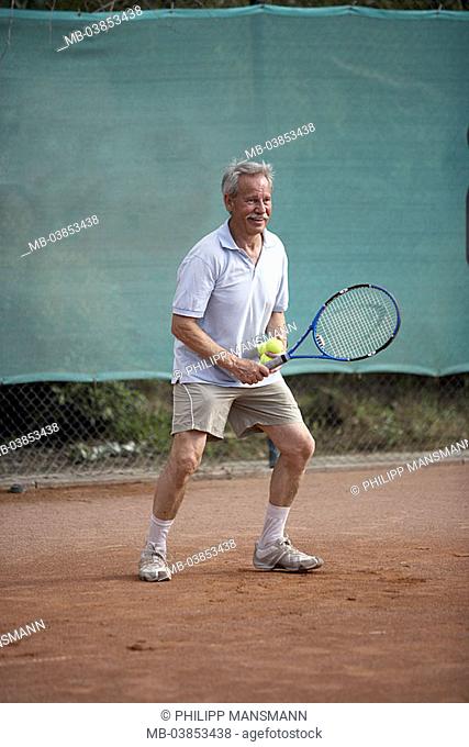 Senior, tennis-games, cheerfully, people, man, 60-70 years, grey-haired, tennis court, tennis rackets, tennis balls, holds, plays, match, tennis-match, sport