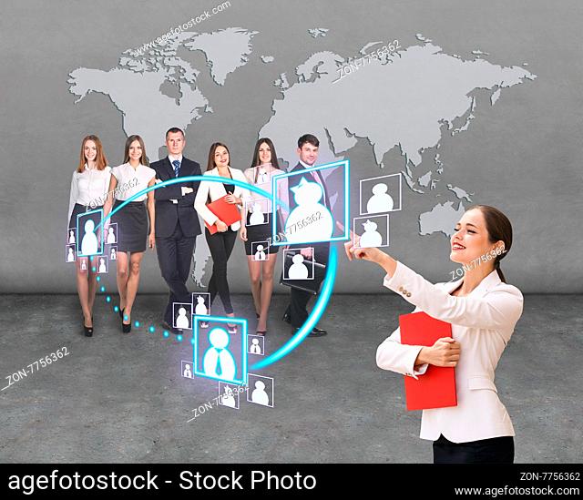 businesswoman shows social network structure her team. Elements of this image furnished by NASA