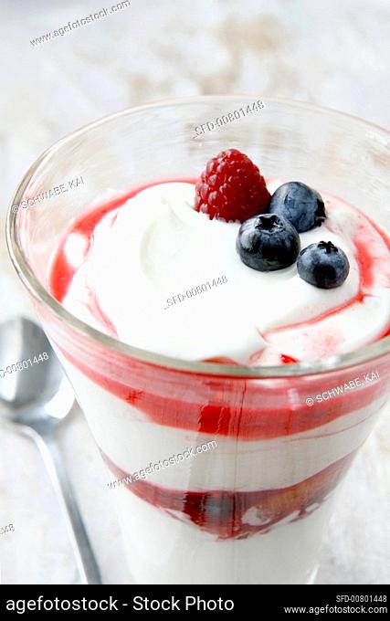 Quark with fruit sauce and berries
