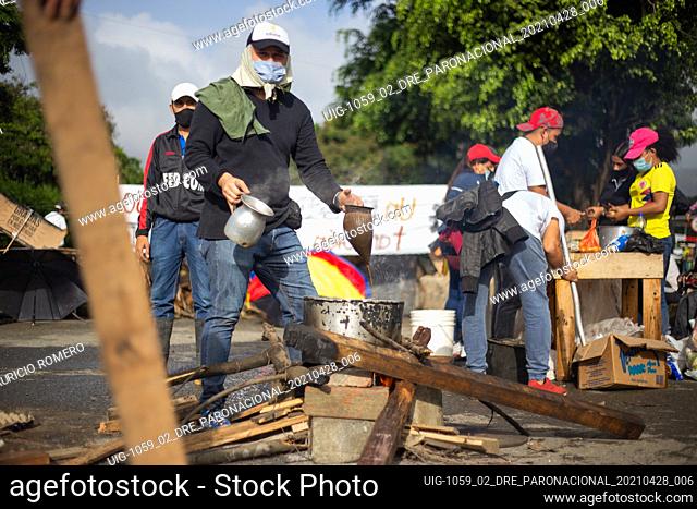 A demonstrator participates in a communitary kitchen at a protester camp as demonstrators gather during the first day of anti-government protests against the...